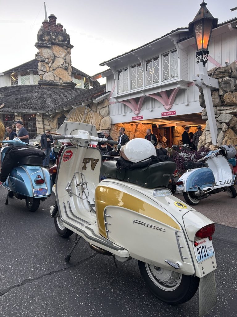 A gold and white vintage TV Lambretta scooter outside the Madonna Inn, California ©Kate Dana